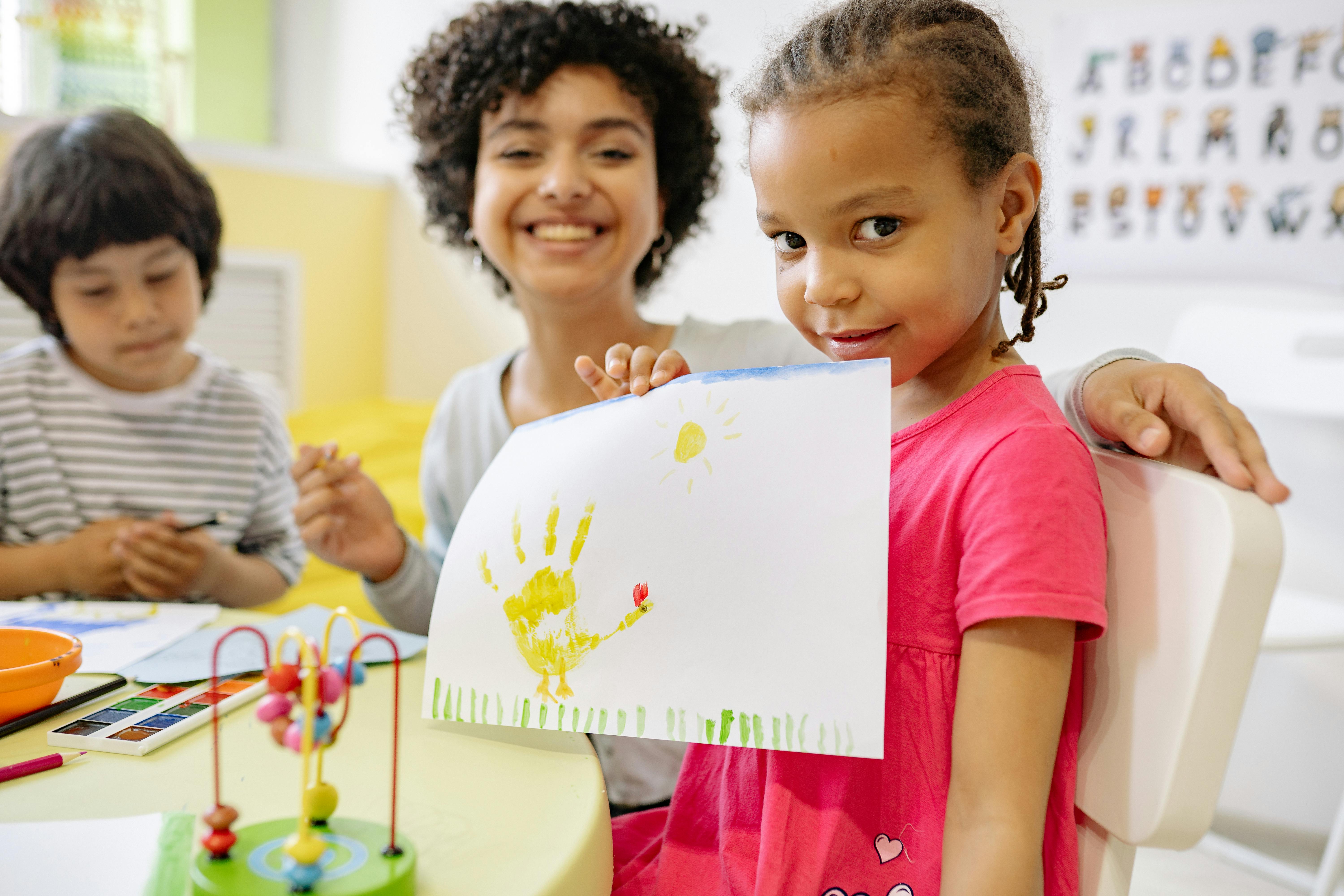 teacher-with-child-drawing